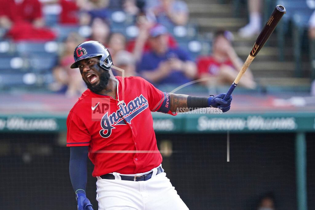 Tony Dejak Cleveland Indians' Franmil Reyes reacts after swinging in the sixth inning of a baseball game against the Minnesota Twins, Saturday, May 22, 2021, in Cleveland. Reyes left the game with an injury. (AP Photo/Tony Dejak)