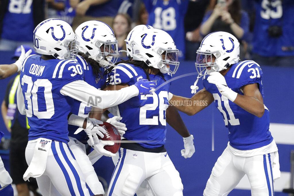 Michael Conroy Indianapolis Colts strong safety Clayton Geathers (26) celebrates with teammates after an interception during the first half of an NFL football game against the Atlanta Falcons, Sunday, Sept. 22, 2019, in Indianapolis. (AP Photo/Michael Conroy)