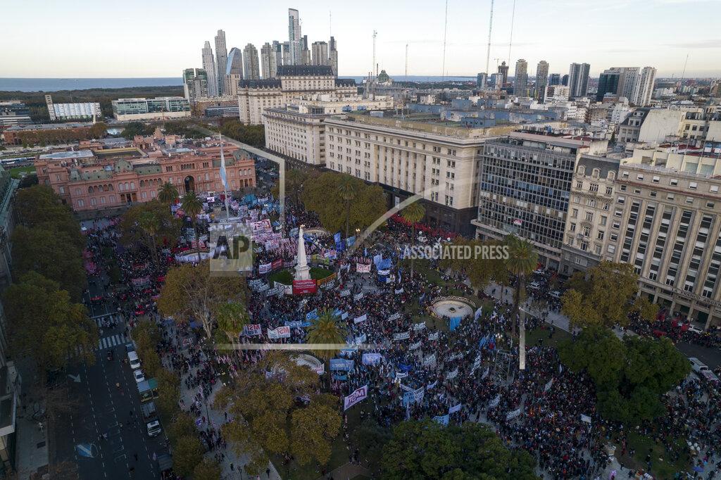Rodrigo Abd People gather in the Plaza de Mayo in a demonstration organized by social organizations representing the unemployed to protest against the government's economic policy, in Buenos Aires, Argentina, Thursday, May 12, 2022. (AP Photo/Rodrigo Abd)