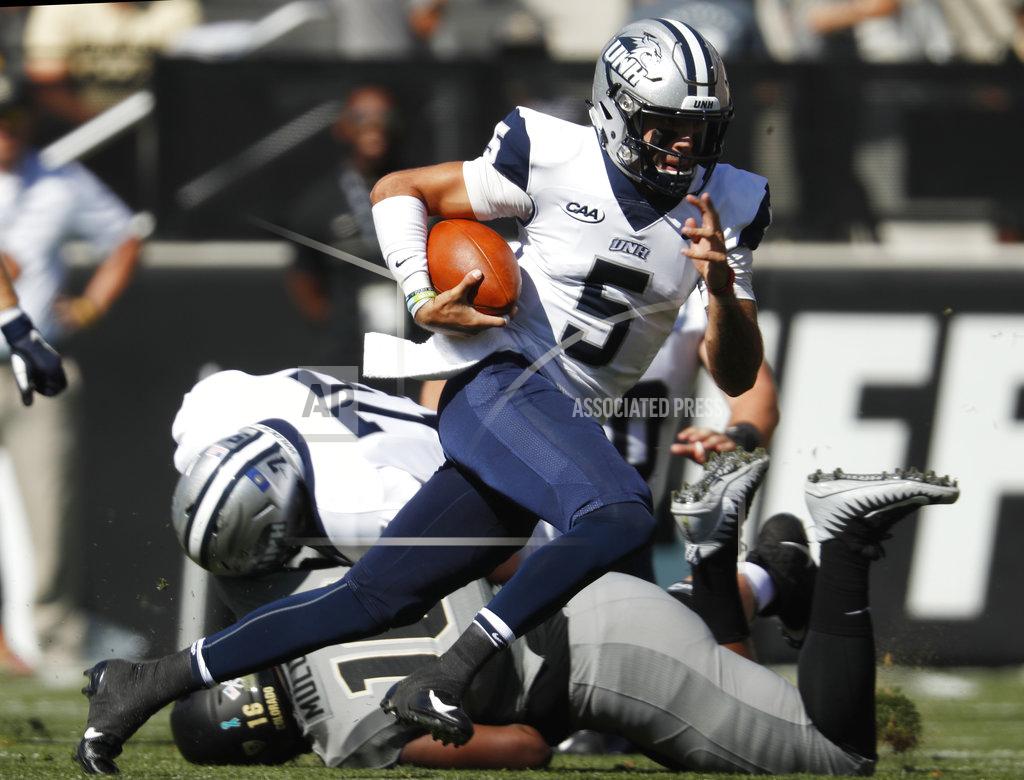 David Zalubowski New Hampshire quarterback Christian Lupoli runs for a short gain against Colorado in the first half of an NCAA college football game Saturday, Sept. 15, 2018, in Boulder, Colo. (AP Photo/David Zalubowski)