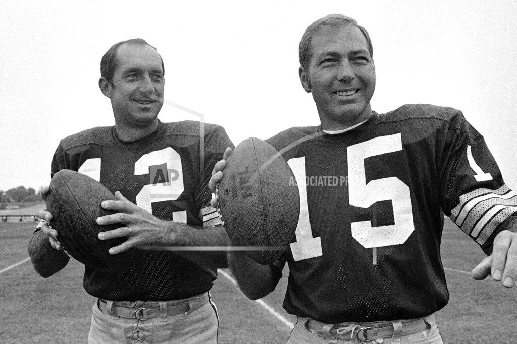 Pjs FILE - In this July 19, 1972, file photo, Green Bay Packers football quarterbacks Zeke Bratkowski (12) and Bart Starr (15) are shown at training camp in Green Bay, Wisc. The Green Bay Packers say Zeke Bratkowski, the quarterback who backed up Bart Starr during the team’s 1960s dynasty, died Monday, Nov. 11, 2019, at his Florida home at age 88. (AP Photo/PJS, File)