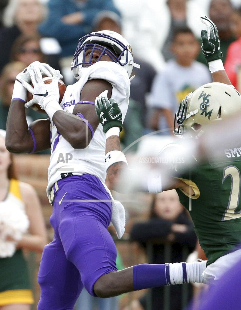 Daniel Sangjib Min James Madison's Kyndel Dean, left, hauls in a touchdown pass against William & Mary's Latrelle Smith during the second half of an NCAA college football game in Williamsburg, Va., on Saturday, Oct. 19, 2019. (Daniel Sangjib Min/Richmond Times-Dispatch via AP)