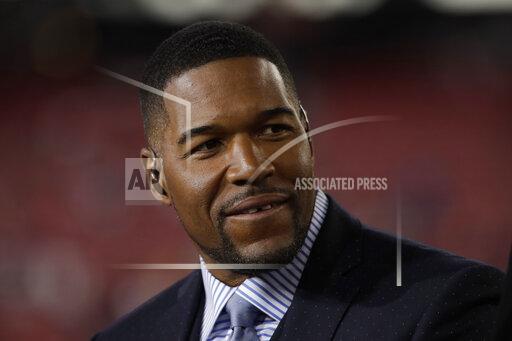 FILE - This Jan. 19, 2020 file photo shows Michael Strahan before the NFL NFC Championship football game between the San Francisco 49ers and the Green Bay Packers in Santa Clara, Calif. Strahan will be among the crew on Blue Origin's next flight to space. The company said Tuesday, Nov. 23, 2021 that the Good Morning America co-host, who just turned 50 on Sunday, will join Laura Shepard Churchley, the eldest daughter of Alan Shepard, on the flight. (AP Photo/Marcio Jose Sanchez, File)