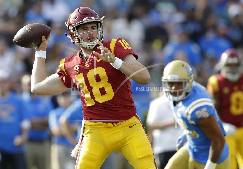 Marcio Jose Sanchez Southern California quarterback JT Daniels (18) throws against UCLA during the first half of an NCAA college football game Saturday, Nov. 17, 2018, in Pasadena, Calif. (AP Photo/Marcio Jose Sanchez)