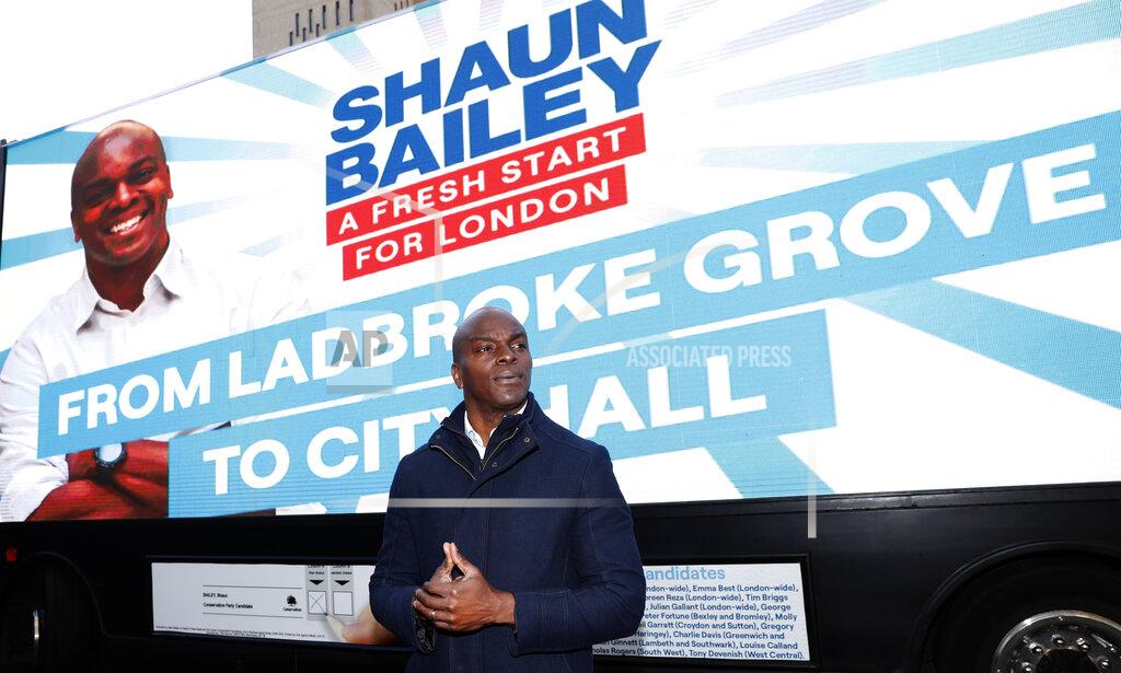 Alastair Grant The Conservative party candidate for London Mayor Shaun Bailey poses by his battle bus in the Ladbroke Grove area of west London during a campaign stop, Thursday, April 29, 2021. (AP Photo/Alastair Grant)