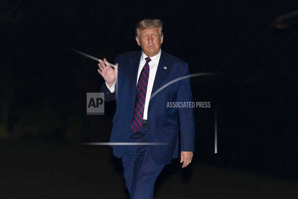 Alex Brandon President Donald Trump waves after stepping off Marine One on the South Lawn of the White House, Tuesday, Sept. 15, 2020, in Washington. Trump is returning from Philadelphia. (AP Photo/Alex Brandon)