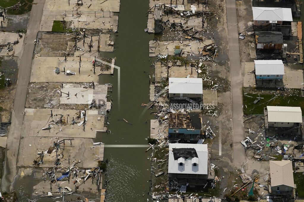 Matt Slocum In this aerial photo, the remains of damaged homes are seen in the aftermath of Hurricane Ida, Monday, Sept. 6, 2021, in Grand Isle, La. (AP Photo/Matt Slocum)
