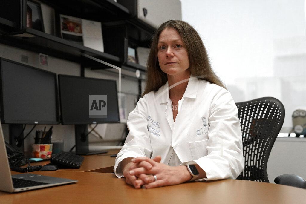 Gerry Broome Dr. Hanna Sanoff poses for a portrait in her office at UNC Hospitals in Chapel Hill, N.C., Tuesday, Sept. 15, 2020. Grief is an inescapable part of the job for cancer doctors. “I have not yet figured out how to help guide patients’ struggles with cancer, leading them toward a death with dignity and finding personal reward in our relationship, when I cannot see them (or) hug them” she says. (AP Photo/Gerry Broome)