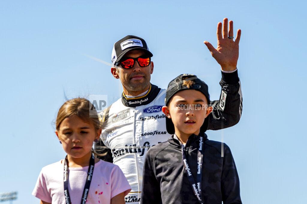 Mike Caudill Aric Almirola is introduced during driver introductions at a NASCAR Cup Series auto race at Richmond Raceway on Sunday, April 3, 2022, in Richmond, Va. (AP Photo/Mike Caudill)
