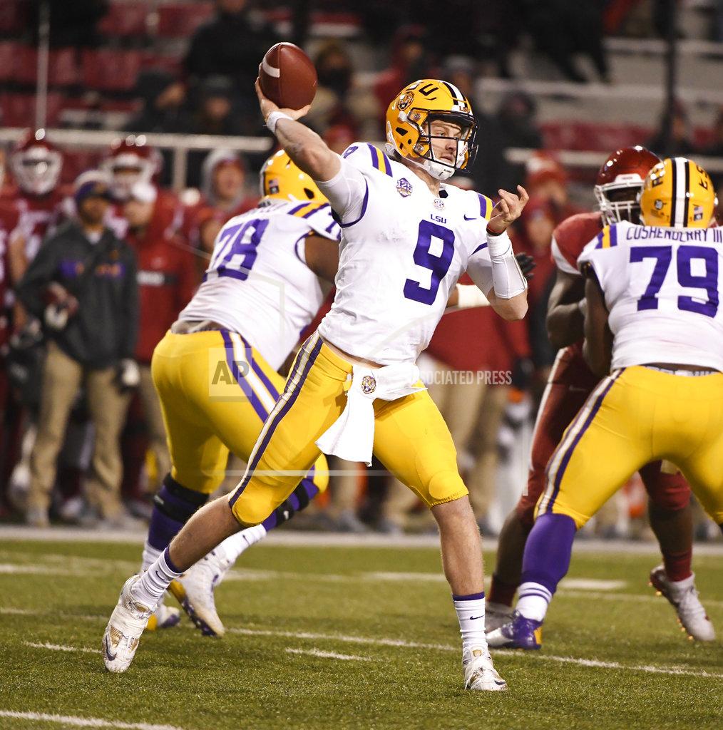 Michael Woods LSU quarterback Joe Burrow throws a pass against Arkansas during the second half of an NCAA college football game, Saturday, Nov. 10, 2018, in Fayetteville, Ark. LSU won, 24-17. (AP Photo/Michael Woods)