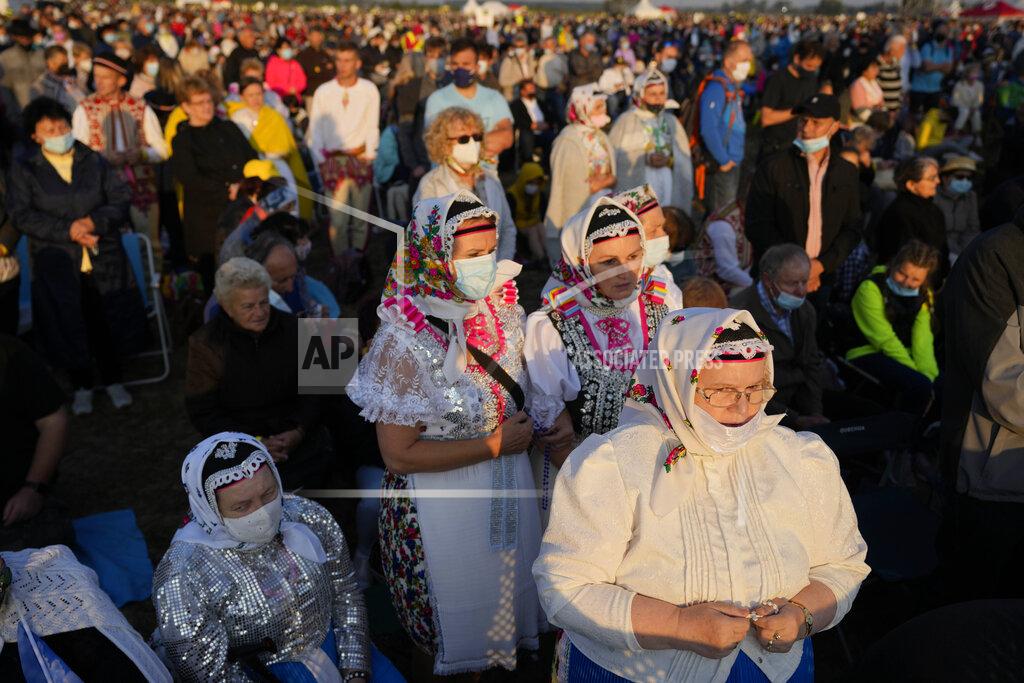Petr David Josek Faithful wait for Pope Francis' arrival in the esplanade of the National Shrine in Sastin, Slovakia, Wednesday, Sept. 15, 2021. Pope Francis is to hold an open air mass in Sastin near the Slovakian capital on Wednesday, the site of an annual pilgrimage each September 15 to venerate Slovakia's patron, Our Lady of Sorrows. (AP Photo/Petr David Josek)