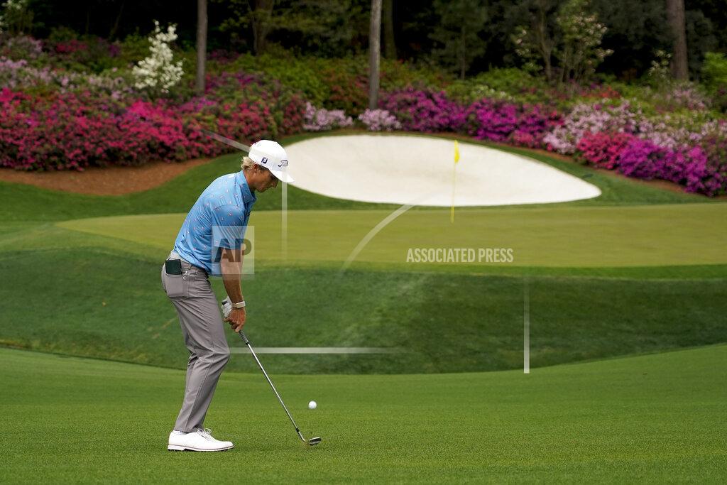 David J. Phillip Will Zalatoris hits to the 13th green during the second round of the Masters golf tournament on Friday, April 9, 2021, in Augusta, Ga. (AP Photo/David J. Phillip)