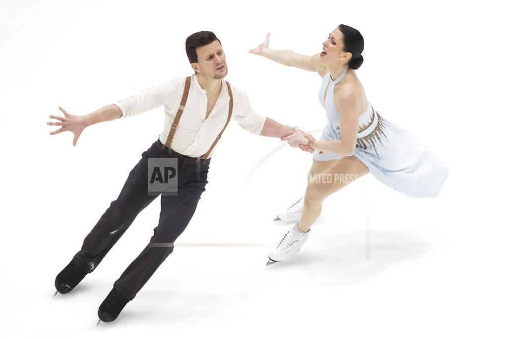 Raul Mee Charlene Guignard and Marco Fabbri of Italy perform during ice dance free dance competition of the ISU European Figure Skating Championships in Tallinn, Estonia, Saturday, Jan. 15, 2022. (AP Photo/Raul Mee)