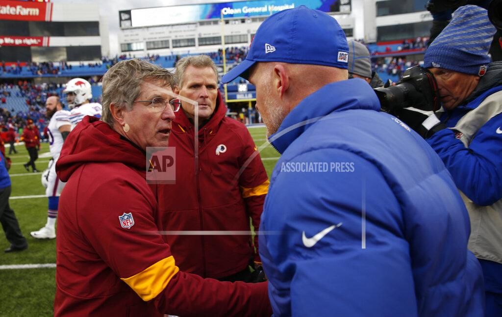 Washington Redskins head coach Bill Callahan, left, congratulates Buffalo Bills head coach Sean McDermott after an NFL football game, Sunday, Nov. 3, 2019, in Orchard Park, N.Y. (AP Photo/John Munson)