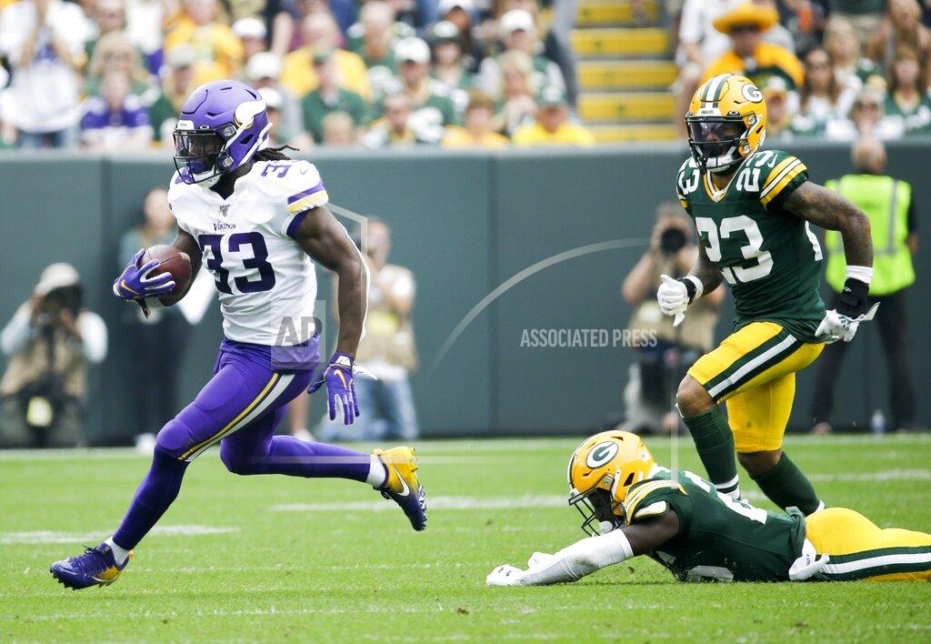 Mike Roemer Minnesota Vikings' Dalvin Cook breaks away from Green Bay Packers' Darnell Savage for a touchdown run during the first half of an NFL football game Sunday, Sept. 15, 2019, in Green Bay, Wis. (AP Photo/Mike Roemer)