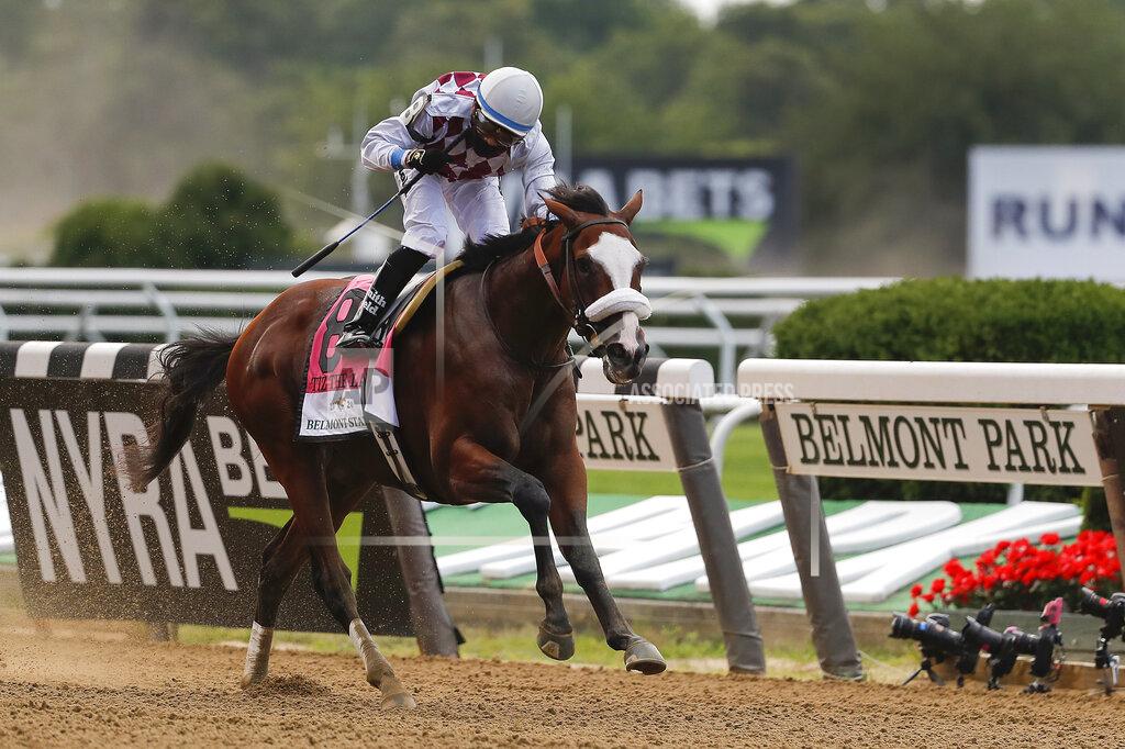 Seth Wenig Tiz the Law (8), with jockey Manny Franco up, crosses the finish line to win the152nd running of the Belmont Stakes horse race, Saturday, June 20, 2020, in Elmont, N.Y. (AP Photo/Seth Wenig)
