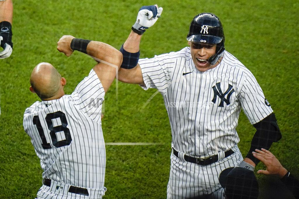 Frank Franklin Ii New York Yankees' Aaron Judge, right, celebrates with teammate Rougned Odor after hiting a two-run home run during the fourth inning of the second game of a baseball doubleheader Thursday, May 27, 2021, in New York. (AP Photo/Frank Franklin II)