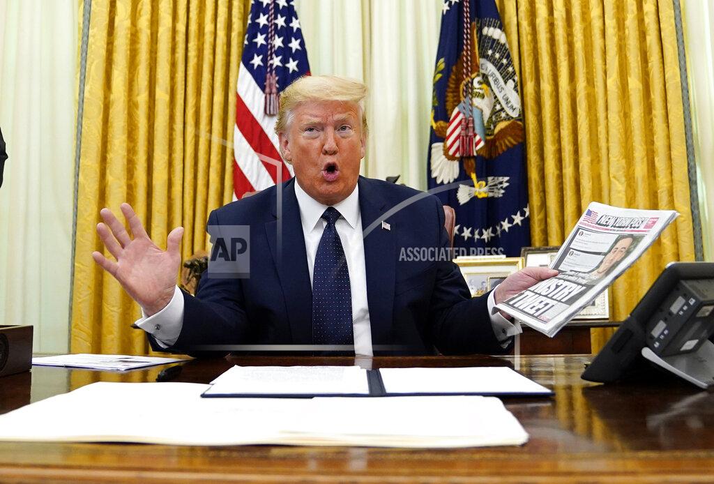 Evan Vucci President Donald Trump speaks before signing an executive order aimed at curbing protections for social media giants, in the Oval Office of the White House, Thursday, May 28, 2020, in Washington. (AP Photo/Evan Vucci)