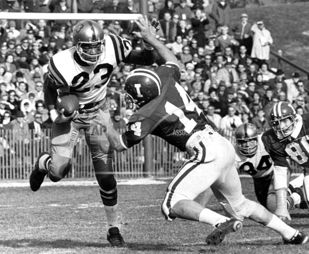 Larry Crewell FILE - Purdue's Leroy Keyes (23) runs as Indiana's Dave Kornowa tries to make a tackle during a college football game in Bloomington, Ind., in this Nov. 25, 1967, file photo. Purdue football star Leroy Keyes, a two-time All-American and one of the greatest players in school history, has died. He was 74. Keyes' family said he died at his home in Indiana Thursday morning, April 15, 2021, surrounded by his wife and children. (Larry Crewell/The Herald-Times via AP)