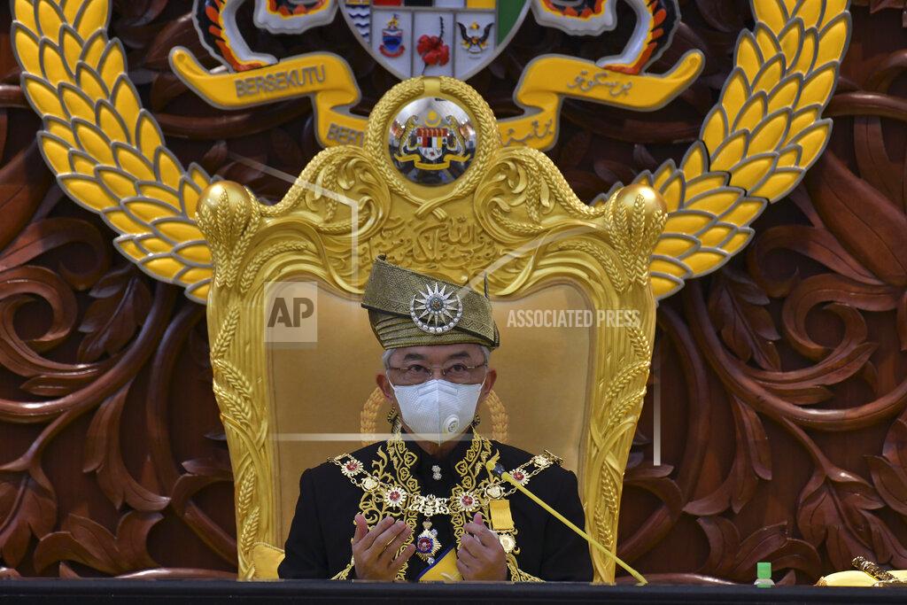 Nazri Rapai In this photo released by Malaysia's Department of Information, Malaysia's King Sultan Abdullah Sultan Ahmad Shah prays during the opening ceremony of the third term of the 14th parliamentary session at parliament house in Kuala Lumpur Monday, May 18, 2020. Malaysia's parliament held an unusual half-day sitting Monday, that was kept short due to the COVID-19 pandemic and saw Prime Minister Muhyiddin Yassin dodge a vote of no-confidence against him over two months since he came into power. (Nazri Rapai/ Malaysia's Department of Information via AP)