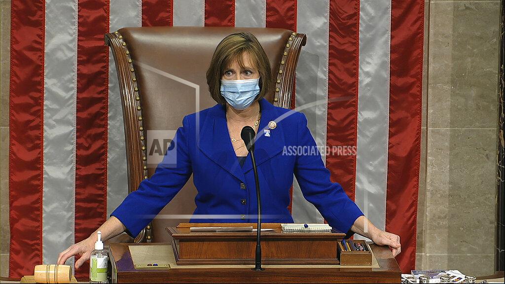 Uncredited In this image from video, Rep. Kathy Castor, D-Fla., sits in the chair and leads the House on the floor of the House of Representatives at the U.S. Capitol in Washington, Thursday, April 23, 2020. (House Television via AP)
