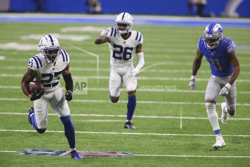 Tony Ding Indianapolis Colts cornerback Kenny Moore II (23) intercepts a pass intended for Detroit Lions wide receiver Marvin Jones (11) and returns the ball 29 yards for a touchdown during the second half of an NFL football game, Sunday, Nov. 1, 2020, in Detroit. (AP Photo/Tony Ding)