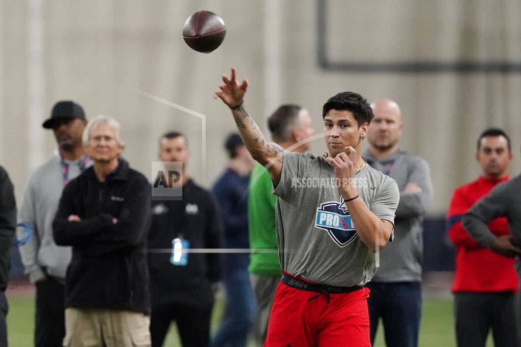 Rogelio V. Solis FILE - Quarterback Matt Corral passes during a drill at the Mississippi football pro day in Oxford, Miss., Wednesday, March 23, 2022. Corral is a possible pick in the NFL Draft. (AP Photo/Rogelio V. Solis)