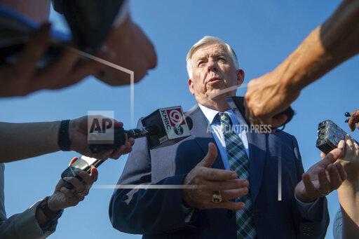 FILE - In this Tuesday, July 13, 2021, file photo, Missouri Gov. Mike Parson answers media's questions in Kansas City, Mo. Parson on Thursday, Oct, 14, 2021 condemned the St. Louis Post-Dispatch newspaper for exposing a flaw in a state database that allowed public access to thousands of teachers' Social Security numbers, even though the paper held off from reporting about the flaw until after the state could fix it. (Shelly Yang/The Kansas City Star via AP, File)
