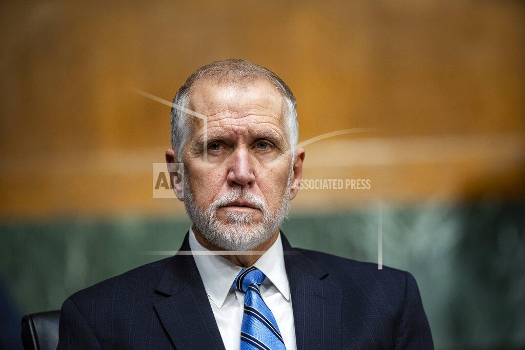 Al Drago Sen. Tom Tillis, R-N.C., listens as Federal Reserve Chair Jerome Powell and Treasury Secretary Steven Mnuchin, not pictured, testify during a Senate Banking Committee hearing on Capitol Hill, on Tuesday, Dec. 1, 2020, in Washington. (Al Drago/The New York Times via AP, Pool)