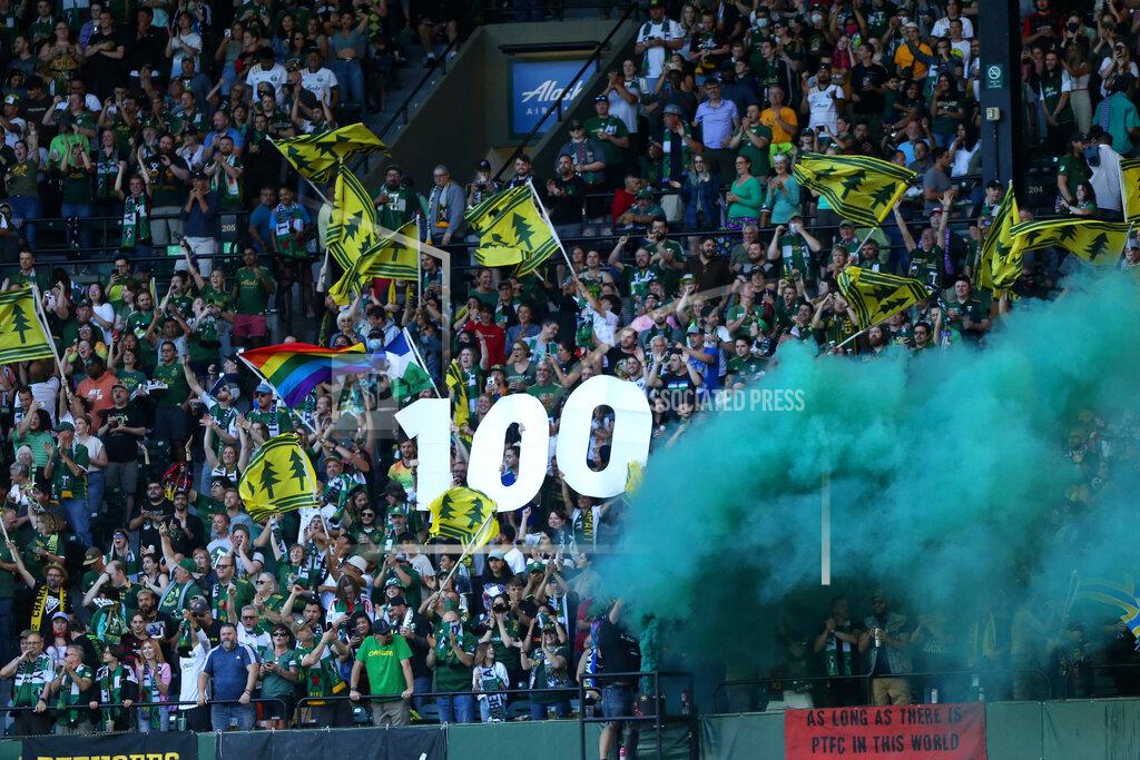 Sean Meagher Members of the Timbers Army hold up a 100 sign celebrating midfielder Diego Valeri's 100th MLS goal, against Los Angeles FC during a soccer match Wednesday, July 21, 2021, in Portland, Ore. (Sean Meagher/The Oregonian via AP)