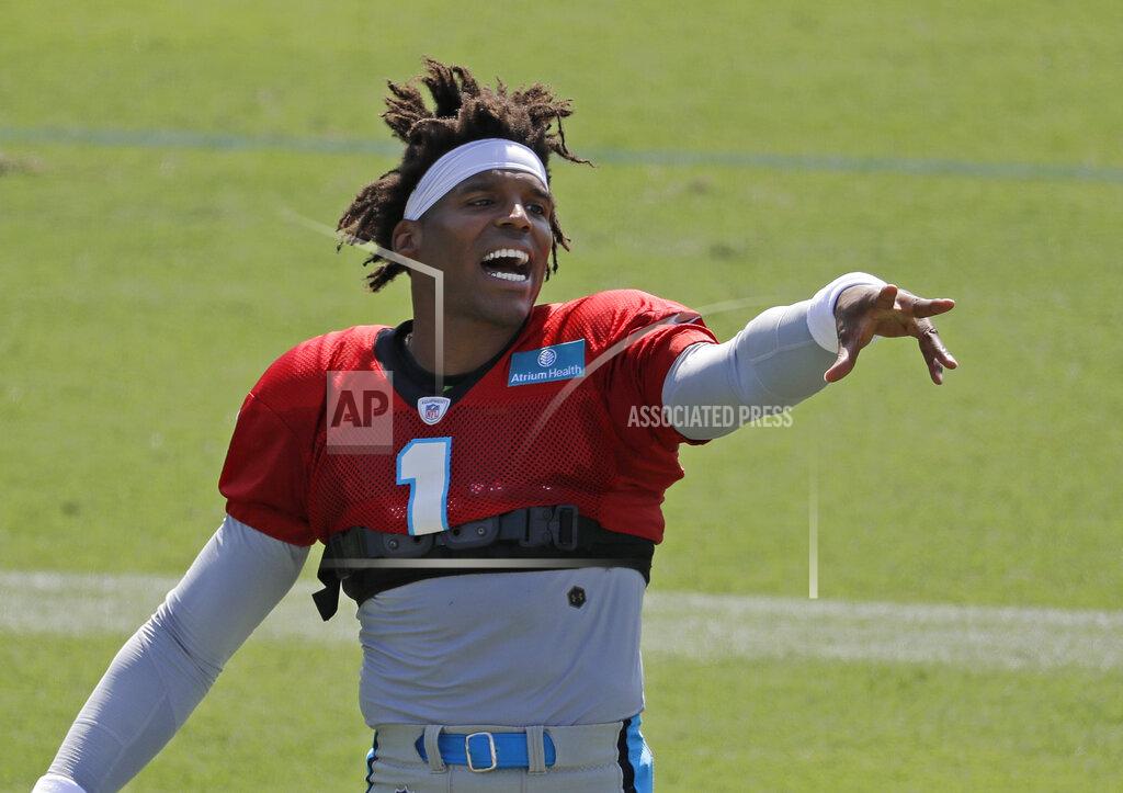 Chuck Burton Carolina Panthers' Cam Newton jokes with the crowd during practice at the NFL football team's training camp in Spartanburg, S.C., Saturday, July 27, 2019. (AP Photo/Chuck Burton)