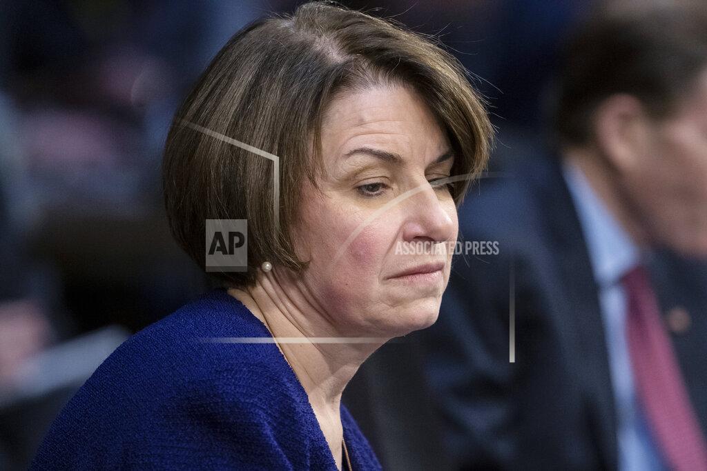 J. Scott Applewhite FILE - In this Feb. 7, 2019 file photo, Senate Judiciary Committee member Sen. Amy Klobuchar, D-Minn., prepares to vote during a committee meeting on Capitol Hill in Washington. Klobuchar announced Thursday that she has been treated for breast cancer and the treatment “went well.” Klobuchar, 61, tweeted that the cancer was found in February during a routine mammogram, and eventually had a lumpectomy to remove cancer. (AP Photo/J. Scott Applewhite)