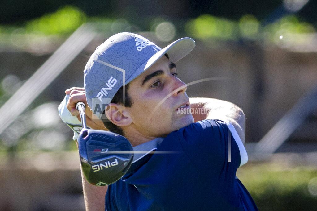 Joaquin Niemann, of Chile, watches his drive down the 10th fairway during third round of the RSM Classic golf tournament, Saturday, Nov. 21, 2020, in St. Simons Island, Ga. (AP Photo/Stephen B. Morton)