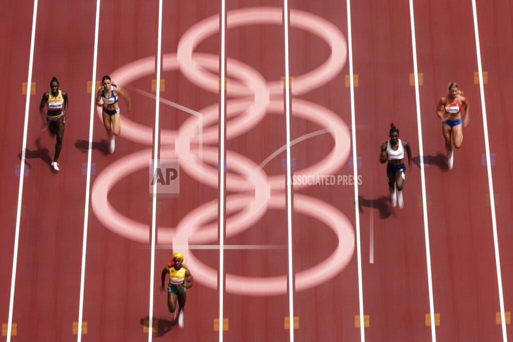 Morry Gash Shelly-Ann Fraser-Pryce, of Jamaica, wins her heat during the semifinals in the women's 200-meter at the 2020 Summer Olympics, Monday, Aug. 2, 2021, in Tokyo. (AP Photo/Morry Gash)