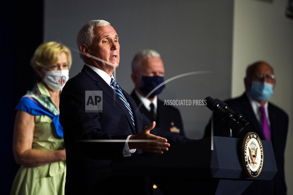 Manuel Balce Ceneta Vice President Mike Pence, with, from left, White House coronavirus response coordinator Dr. Deborah Birx, Adm. Brett Giroir, head of the U.S. Public Health Service and Director of the Centers for Disease Control and Prevention Robert Redfield, takes off his face mask at the start of a White House Coronavirus Task Force briefing at the Department of Education building Wednesday, July 8, 2020, in Washington. (AP Photo/Manuel Balce Ceneta)