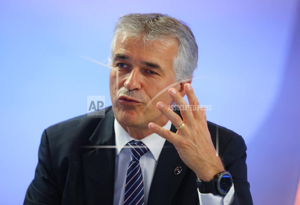 Michel Euler CEO of Citroen Vincent Cobee gestures a he speaks to the media during the presentation of the e-C4 all electric hatchback during a in Paris, Tuesday, June 30, 2020. PSA Group's Citroen Brand is showing off a new version of its C4 compact hatchback, a model that will be key to the company's sales prospects as it faces a highly competitive European car market that faces severe headwinds from the coronavirus. (AP Photo/Michel Euler)