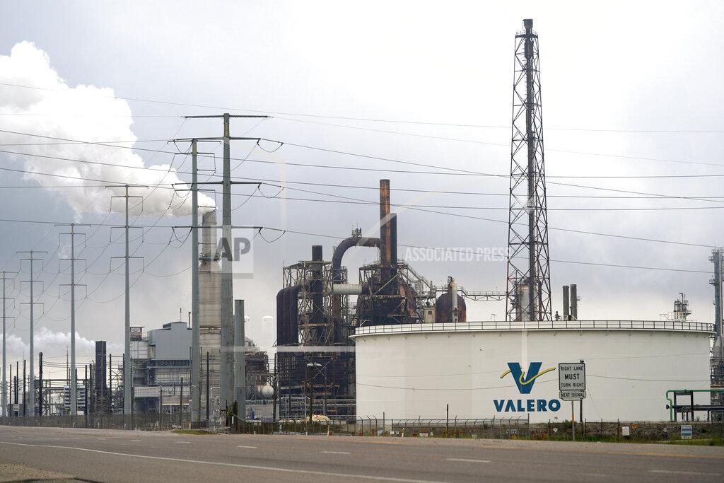 David J. Phillip The Valero Port Arthur Refinery is shown Monday, March 23, 2020, in Port Arthur, Texas. The Texas Gulf Coast is the United States’ petrochemical corridor, with four of the country’s 10 biggest oil and gas refineries and thousands of chemical facilities. (AP Photo/David J. Phillip)