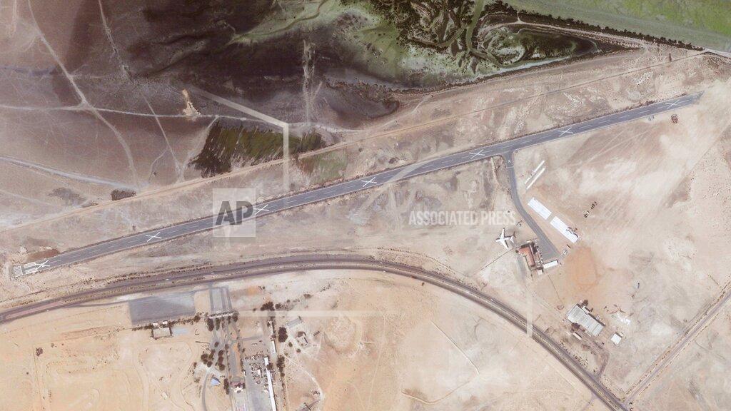 Planet Labs Pbc This satellite image from Planet Labs PBC shows a deactivated airport long home to an Ilyushin Il-76 cargo jet once flown on behalf of arms smuggler Viktor Bout in Umm al-Quwain, United Arab Emirates, March 23, 2022. The Soviet-era cargo plane linked to the arms smuggler known as the "Merchant of Death" is being dismantled in a sheikhdom in the United Arab Emirates, even as Russia suggests trading him for American prisoners Moscow holds amid the war in Ukraine. (Planet Labs PBC via AP)