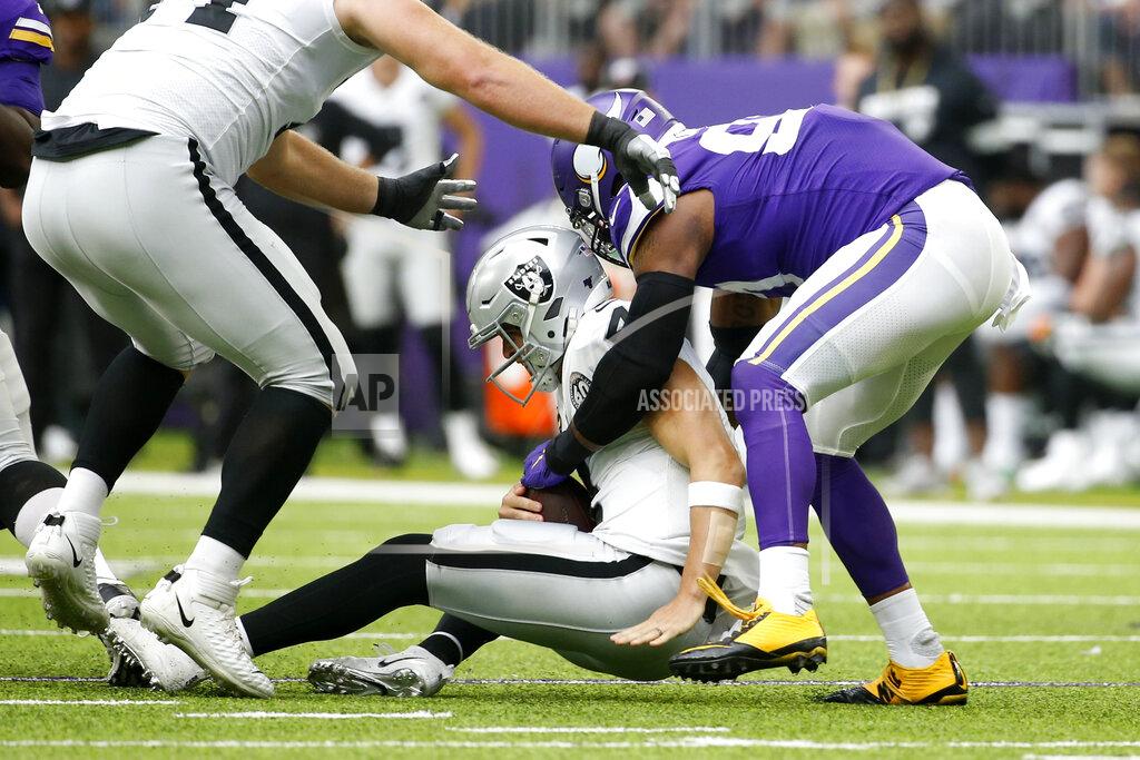 Bruce Kluckhohn Minnesota Vikings defensive end Everson Griffen, right, sacks Oakland Raiders quarterback Derek Carr during the first half of an NFL football game, Sunday, Sept. 22, 2019, in Minneapolis. (AP Photo/Bruce Kluckhohn)