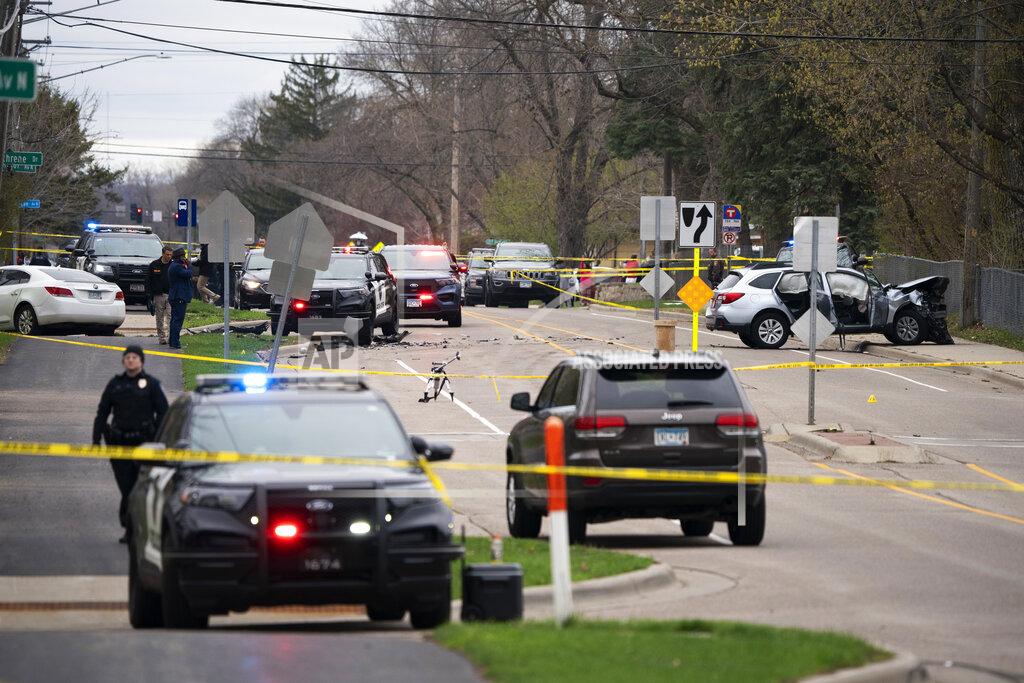 Jeff Wheeler Authorities work the scene at the site of a shooting involving a police officer, Sunday, April 11, 2021, in Brooklyn Center, Minn. (Jeff Wheeler/Star Tribune via AP)