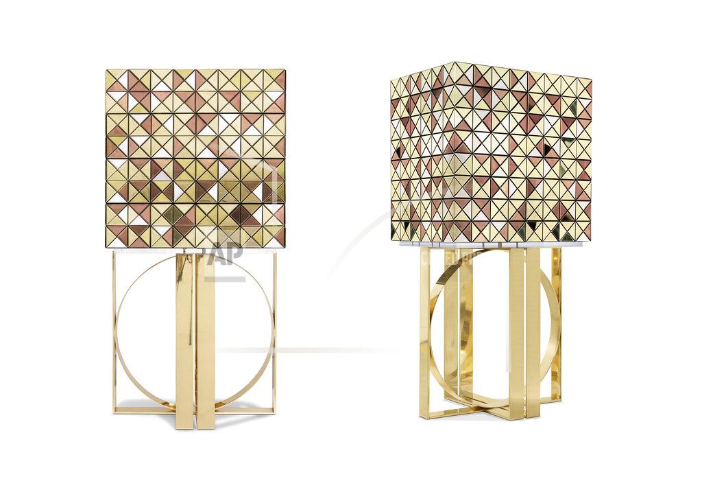 Uncredited This combination of images released by Boca do Lobo shows the Pixel bar cabinet, clad in over a thousand multicolored triangles made of woods like palisander and African walnut, evoking a pixelated image. Inside, mirror and diamond-quilted blue silk showcases nine drawers, each with a golden knob. (Boca do Lobo via AP)