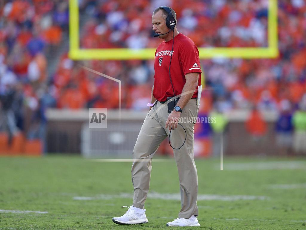 Richard Shiro North Carolina State head coach Dave Doeren walks across the field during the second half of an NCAA college football game against Clemson, Saturday, Oct. 20, 2018, in Clemson, S.C. (AP Photo/Richard Shiro)
