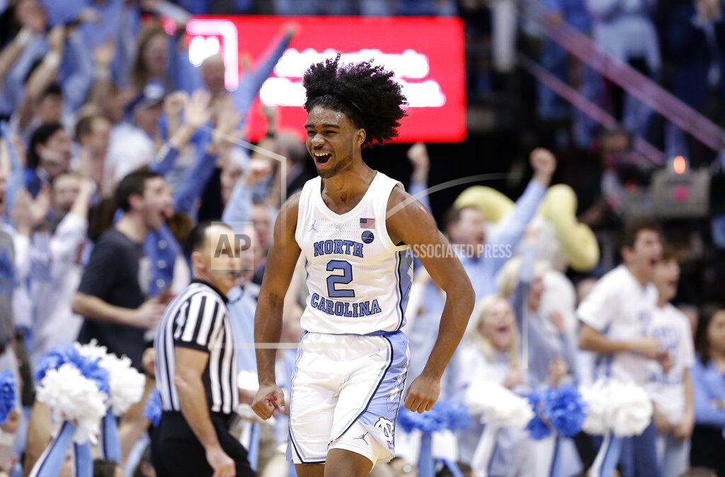 Gerry Broome North Carolina's Coby White (2) reacts following a play against Duke during the second half of an NCAA college basketball game in Chapel Hill, N.C., Saturday, March 9, 2019. North Carolina won 79-70. (AP Photo/Gerry Broome)