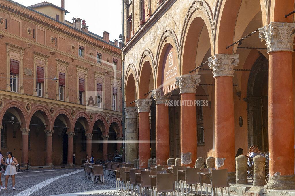 Guido Calamosca A view of Bologna's porticoes in Bologna, Italy, Wednesday, July 28, 2021. Bologna's 12th-century porticoes, still part of the city's everyday life, have been added to the World Heritage List. At a meeting in China on Wednesday, the World Heritage Committee of UNESCO, the U.N. culture agency, inscribed the porticoes on the prestigious list. The addition raises to 58 the number of Italian sites on the list. (Guido Calamosca/LaPresse via AP)