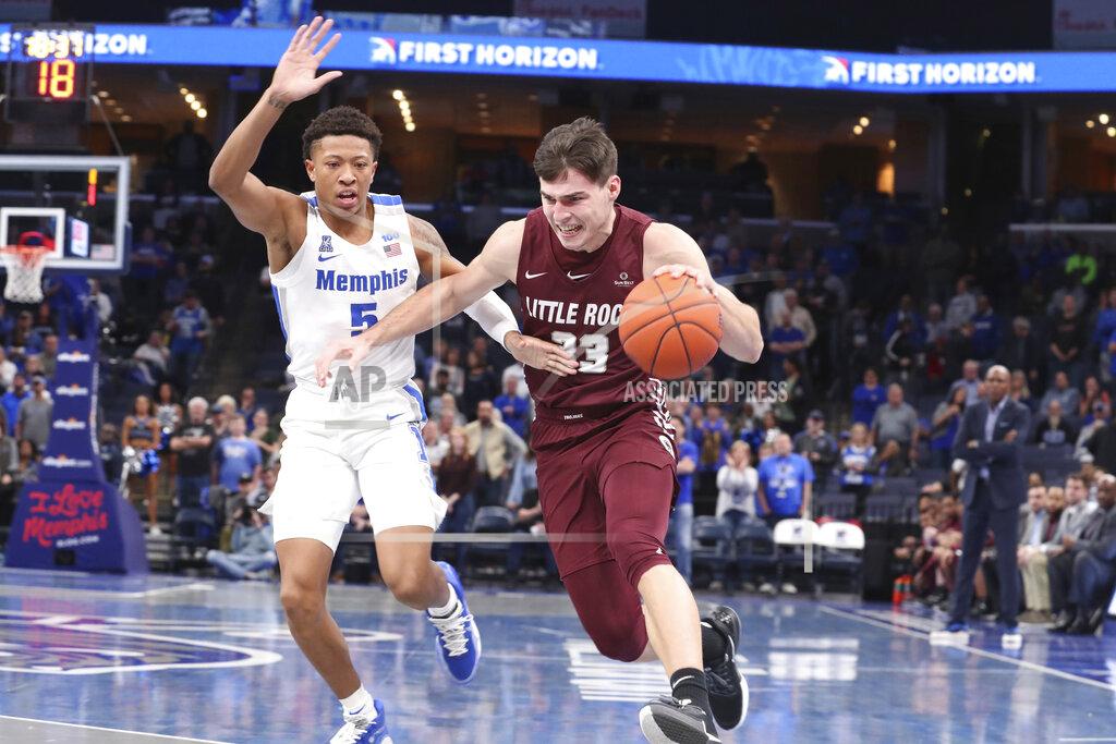 Karen Pulfer Focht Memphis' Boogie Ellis (5) defends Little Rock's Jovan Stulic (33) during the first half of an NCAA college basketball game Wednesday, Nov. 20, 2019, in Memphis, Tenn. (AP Photo/Karen Pulfer Focht)