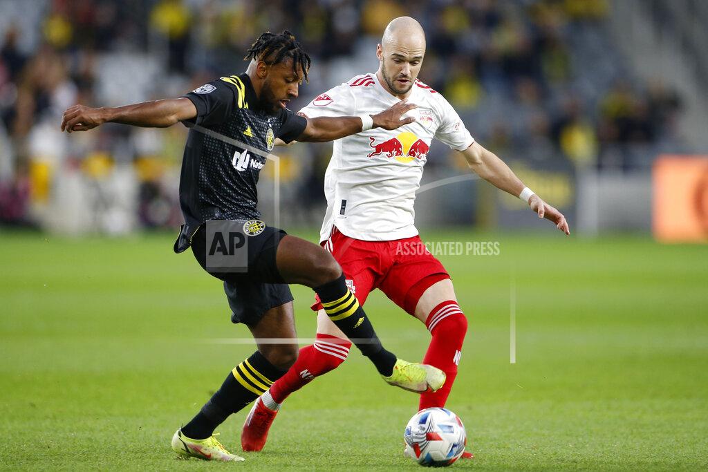 Jay Laprete New York Red Bulls' Andrew Gutman, right, and Columbus Crew's Steven Moreira compete for control of the ball during the first half of an MLS soccer match Saturday, Oct. 23, 2021, in Columbus, Ohio. (AP Photo/Jay LaPrete)