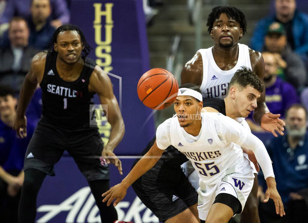 Andy Bao Washington guard Quade Green (55) eyes the ball on a rebound against Seattle during the first half of an NCAA college basketball game, Tuesday, Dec. 17, 2019, in Seattle. (Andy Bao/The Seattle Times via AP)