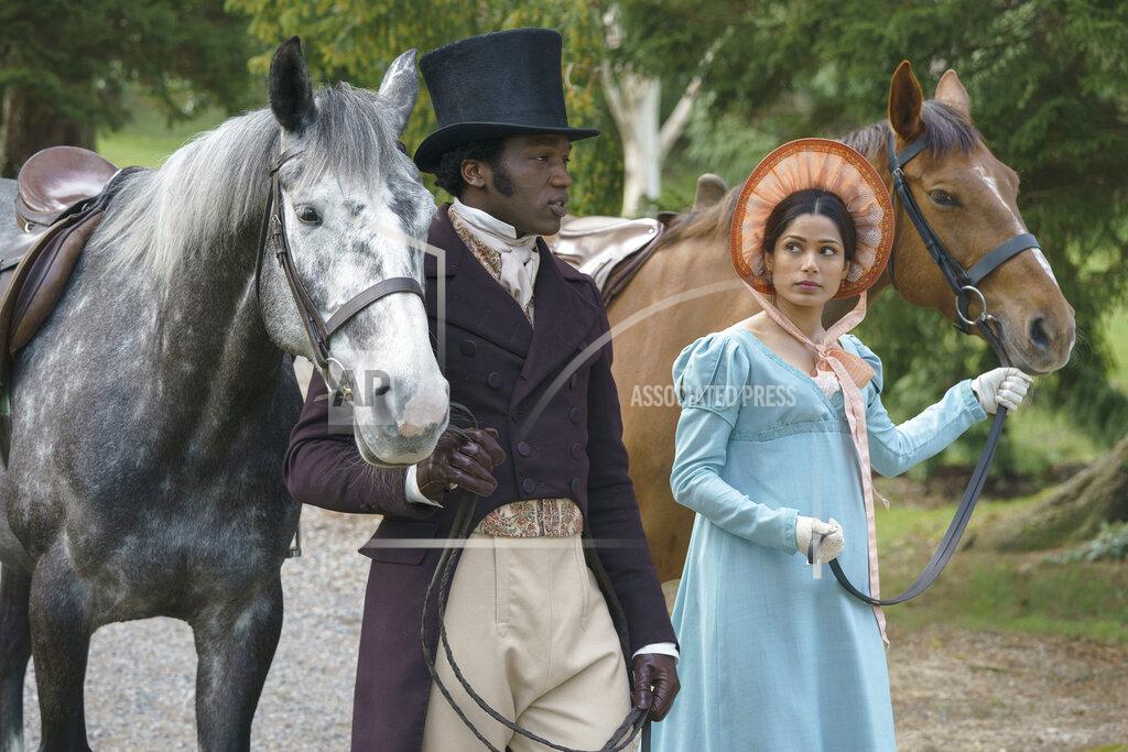 Ross Ferguson This image released by Bleecker Street shows Ṣọpẹ́ Dìrísù, left, and Freida Pinto in a scene from "Mr. Malcolm's List." (Ross Ferguson/Bleecker Street via AP)