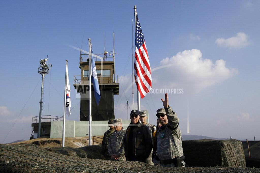 Lee Jin-Man FILE - In this Dec. 7, 2013, file photo, then U.S. Vice President Joe Biden, center, visits Observation Post Ouellette inside the Demilitarized Zone (DMZ), near the border village of Panmunjom, which has separated the two Koreas since the Korean War, South Korea. As Americans celebrate or fume over the new president-elect, many in Asia are waking up to the reality of a Joe Biden administration with decidedly mixed feelings. Relief and hopes of economic and environmental revival jostle with needling anxiety and fears of inattention. Biden has endorsed a slower approach built from working-level meetings and said he would be willing to tighten sanctions on the North until it takes concrete denuclearization steps. (AP Photo/Lee Jin-man, Pool, File)