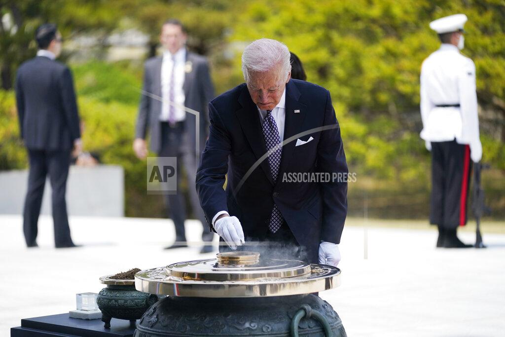 Evan Vucci President Joe Biden participates in a wreath laying ceremony at Seoul National Cemetery, Saturday, May 21, 2022, in Seoul. (AP Photo/Evan Vucci)